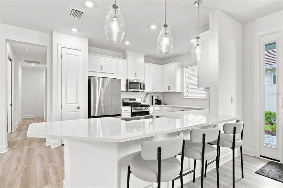 Furnished interior view inside a new home in Esplanade at Azario Lakewood Ranch, Bradenton (Image 7). Furnished interior view inside a new home in Esplanade at Azario Lakewood Ranch, Bradenton (Image 7).
