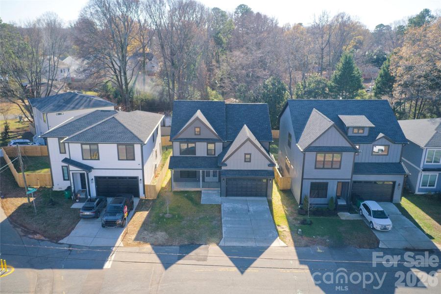 Front exterior of a new home in , Charlotte, NC, highlighting curb appeal (Image 16).