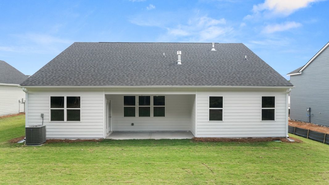 Exterior details and patio area of a home in Preserve at Dove Creek, Statham (Image 19).