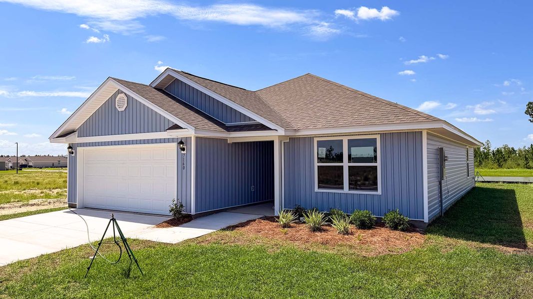 Front exterior of a new home in Liberty, Panama City, FL, highlighting curb appeal (Image 2). Front exterior of a new home in Liberty, Panama City, FL, highlighting curb appeal (Image 2).