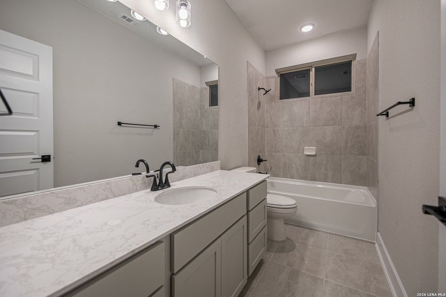 Furnished interior view inside a new home in The Reserve at Potranco Oaks, Castroville (Image 6).