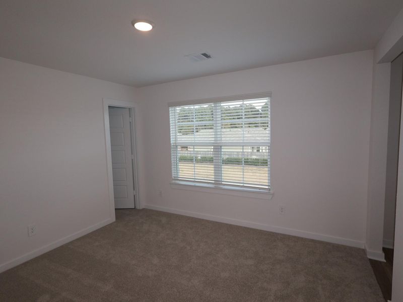 Spacious, unfurnished interior of a new home in Lone Star Landing, Montgomery (Image 36).