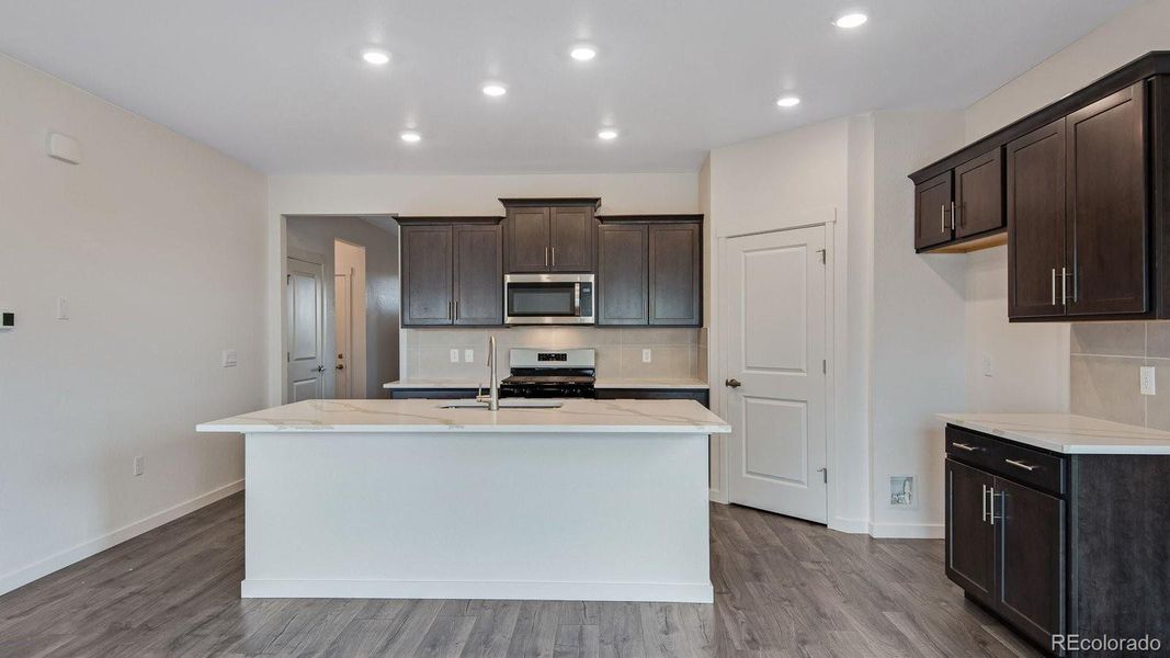Furnished interior view inside a new home in Trails at Crowfoot, Parker (Image 6).