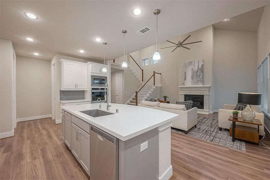 The focal point of the home, this stunning kitchen combines luxury, functionality, and style to create the perfect culinary experience.