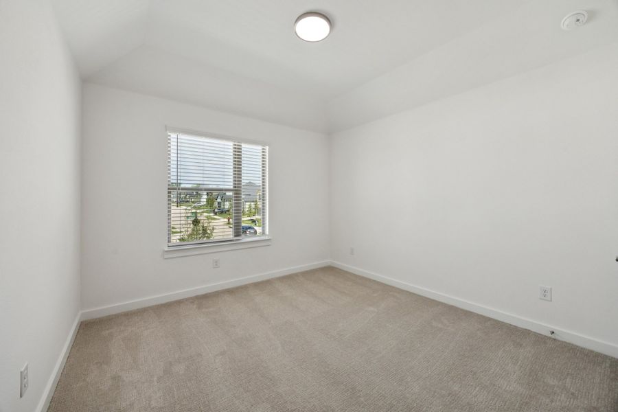 Bedroom in the Monet II home plan by Trophy Signature Homes – REPRESENTATIVE PHOTO