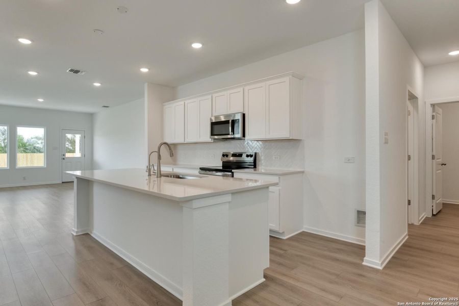 Furnished interior view inside a new home in Meadows at Hennersby Hollow 40's, San Antonio (Image 8).