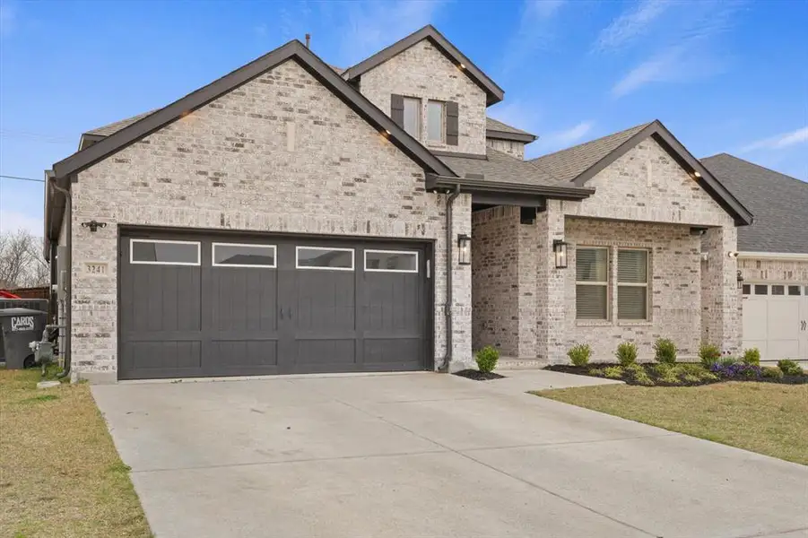 Front exterior of a new home in , Anna, TX, highlighting curb appeal (Image 2). Front exterior of a new home in , Anna, TX, highlighting curb appeal (Image 2).