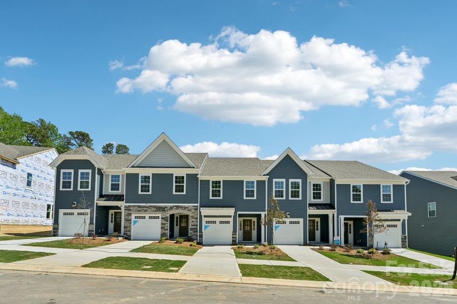 Front exterior of a new home in Bell Glen, Charlotte, NC, highlighting curb appeal (Image 2). Front exterior of a new home in Bell Glen, Charlotte, NC, highlighting curb appeal (Image 2).