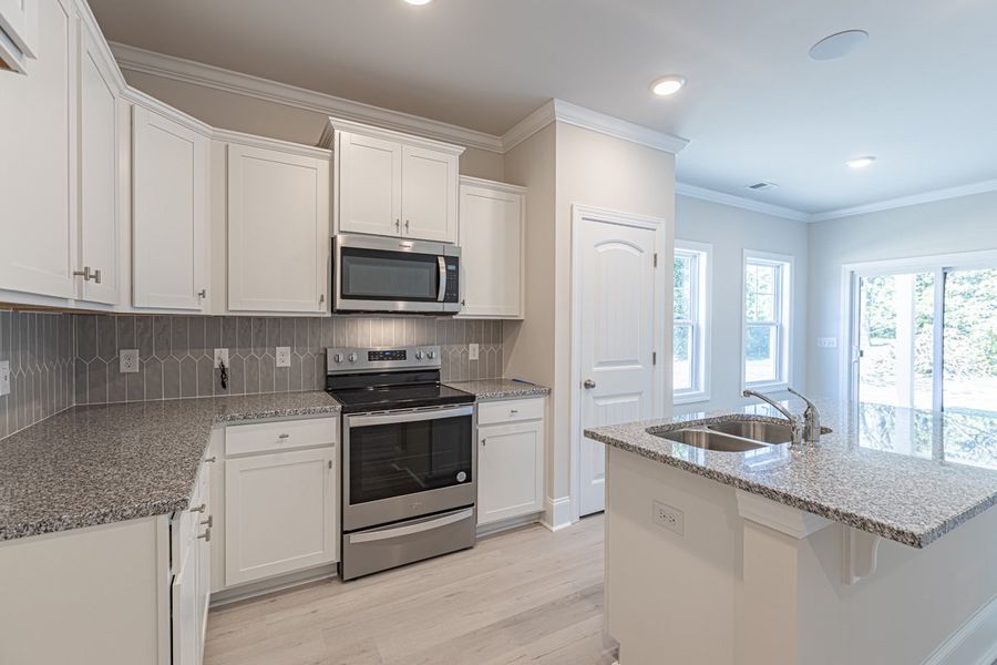 Representative furnished interior of a home built from the Habersham II by Great Southern Homes in Old Charleston Acres, Pelion (Image 10).