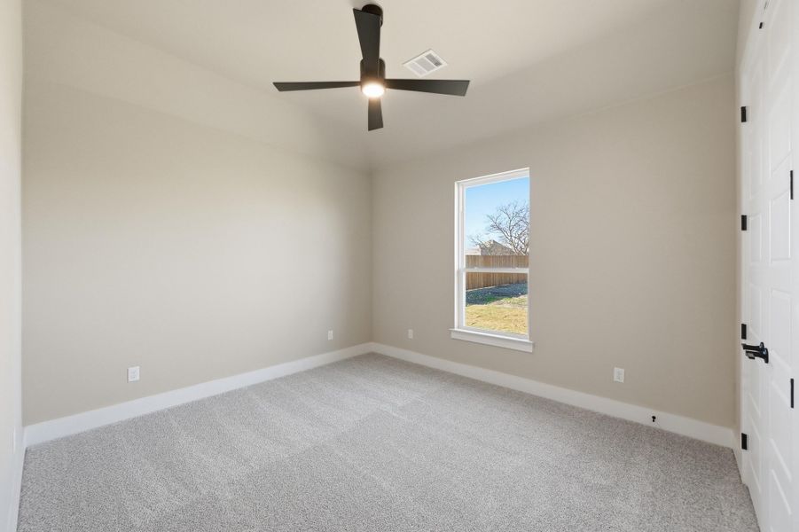 Spacious, unfurnished interior of a new home in Coyote Crossing, Godley (Image 34).