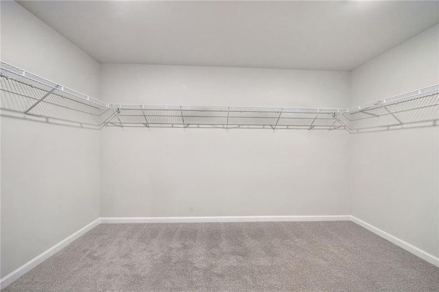 Spacious, unfurnished interior of a new home in Vines at Mill Creek - Estate Series, Braselton (Image 37).