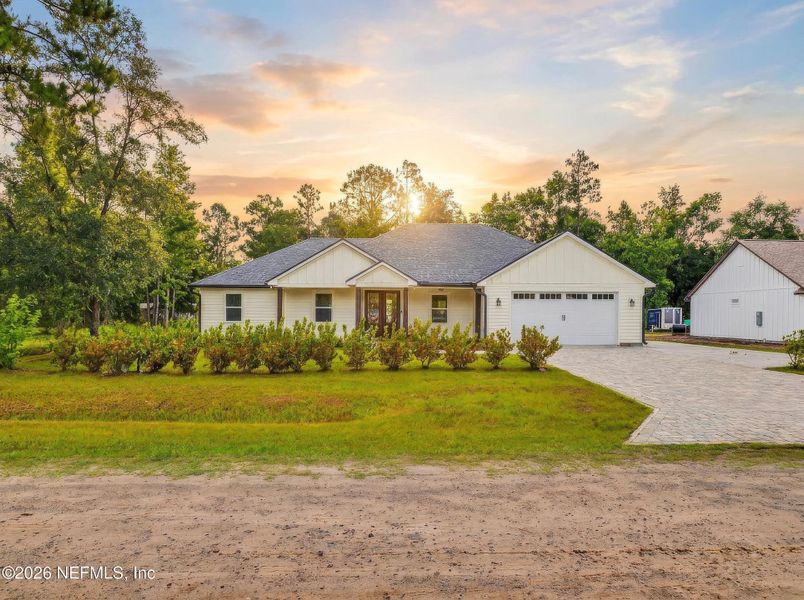 Front exterior of a new home in , Callahan, FL, highlighting curb appeal (Image 23).