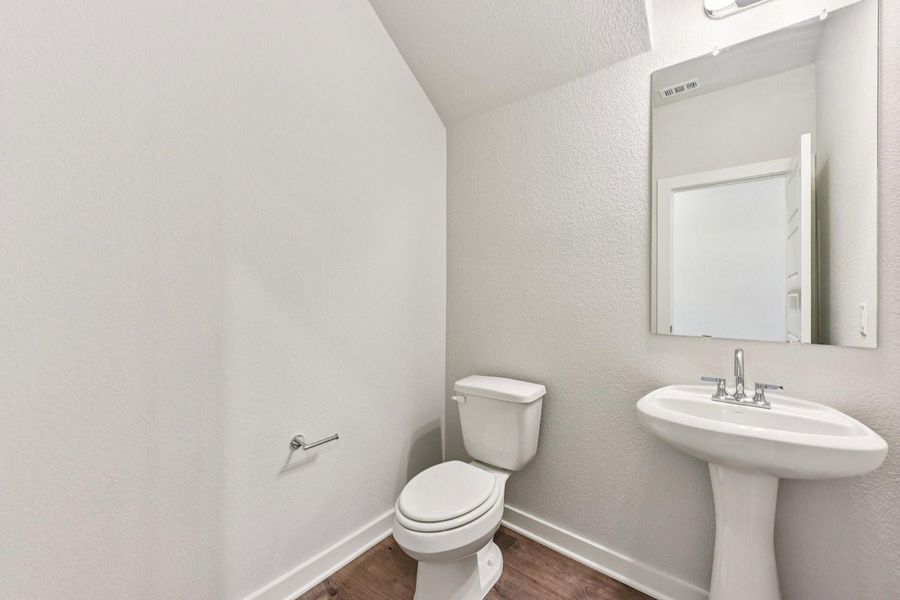 Furnished interior view inside a new home in Stallion Run, Buda (Image 9).