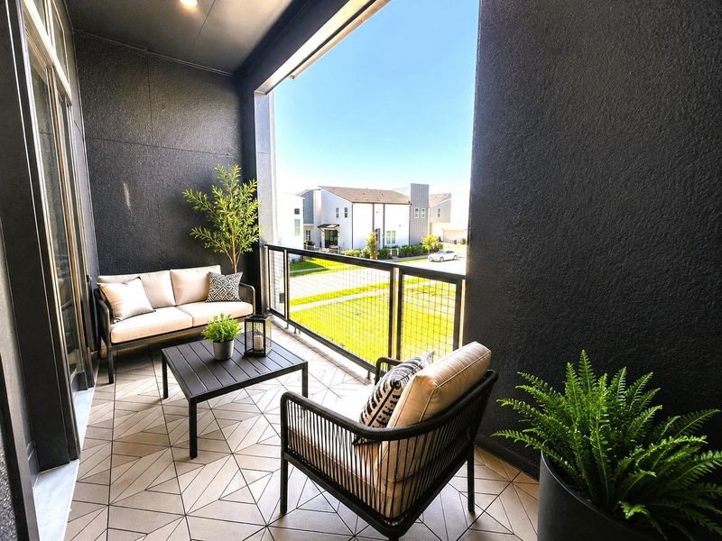 Walkout Living Room Balcony large enough for actual patio furniture (Picture was virtually staged) Walkout Living Room Balcony large enough for actual patio furniture (Picture was virtually staged)