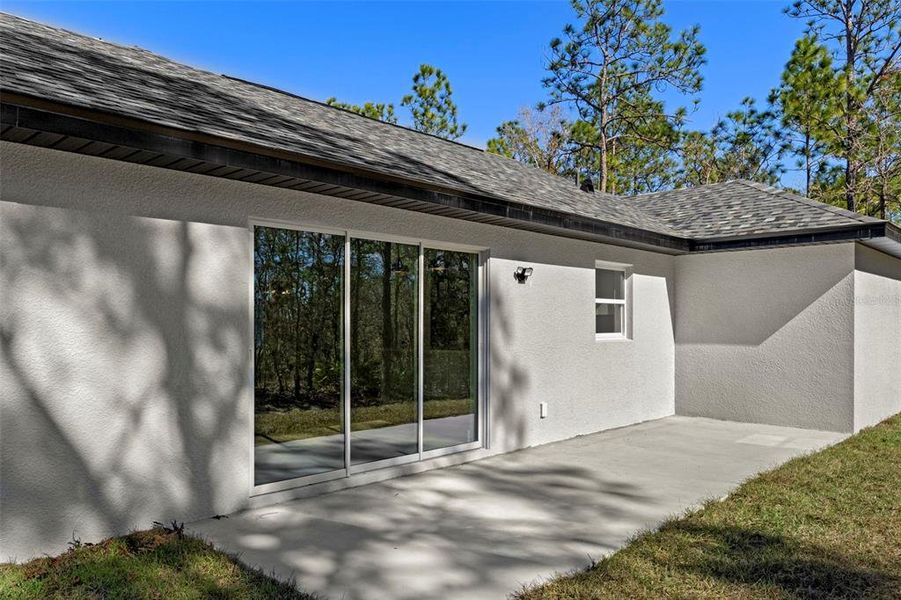 Exterior details and patio area of a home in , Brooksville (Image 4).