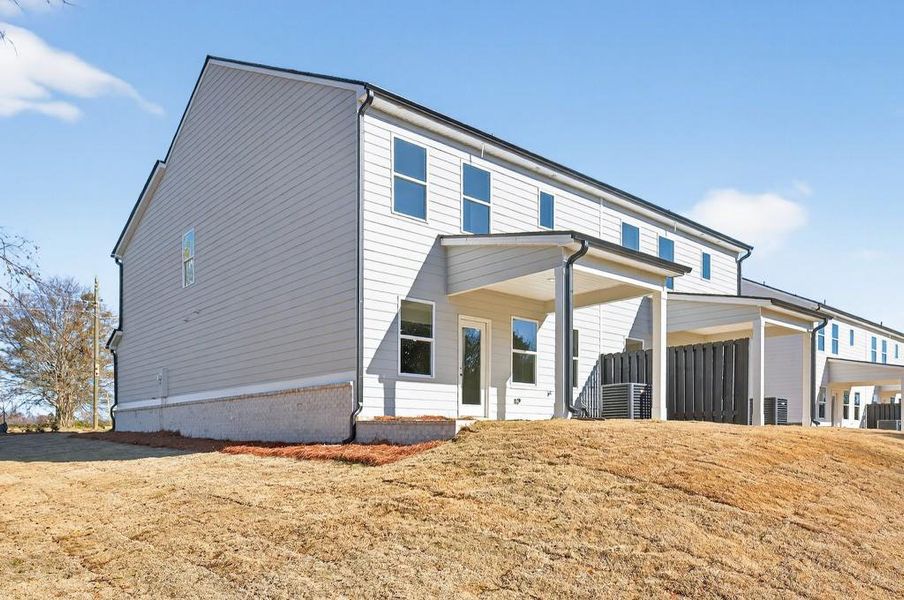 Exterior details and patio area of a home in , Commerce (Image 3).