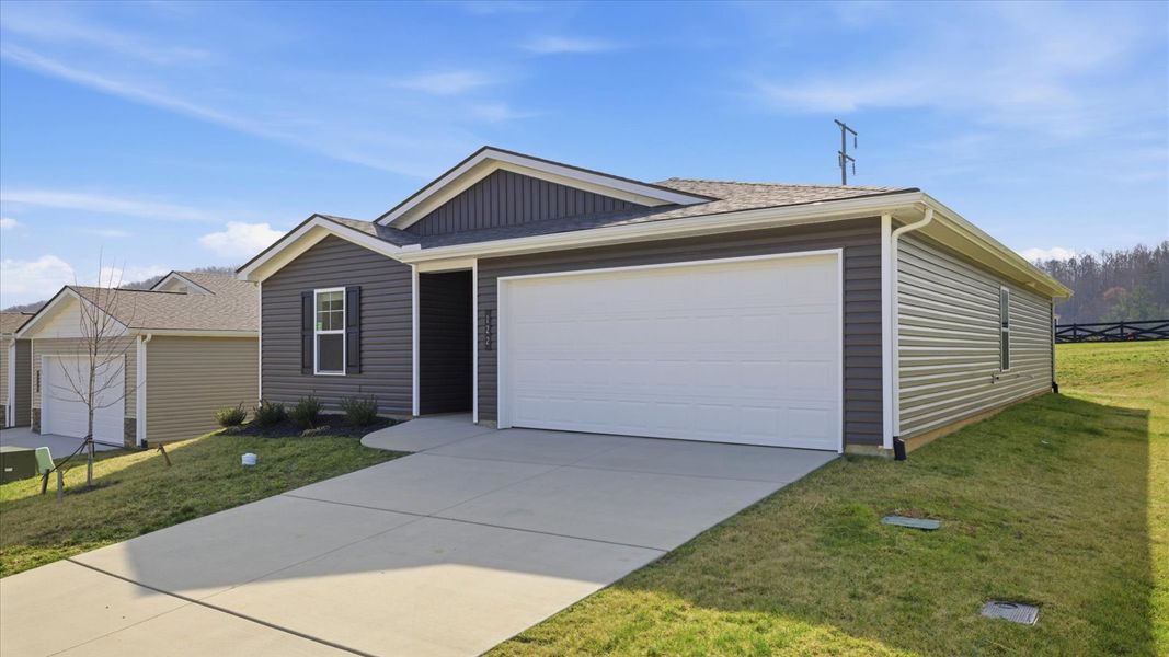 Front exterior of a new home in Emory Creek, Harriman, TN, highlighting curb appeal (Image 2).