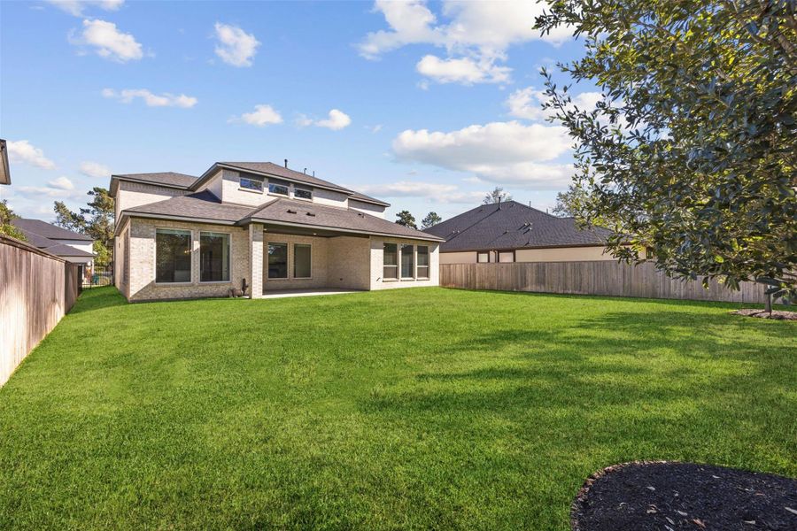 Exterior details and patio area of a home in , Tomball (Image 25). Exterior details and patio area of a home in , Tomball (Image 25).