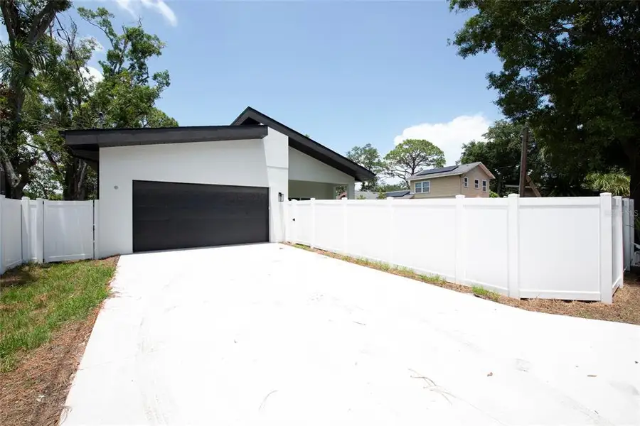 Front exterior of a new home in , St. Petersburg, FL, highlighting curb appeal (Image 1). Front exterior of a new home in , St. Petersburg, FL, highlighting curb appeal (Image 1).