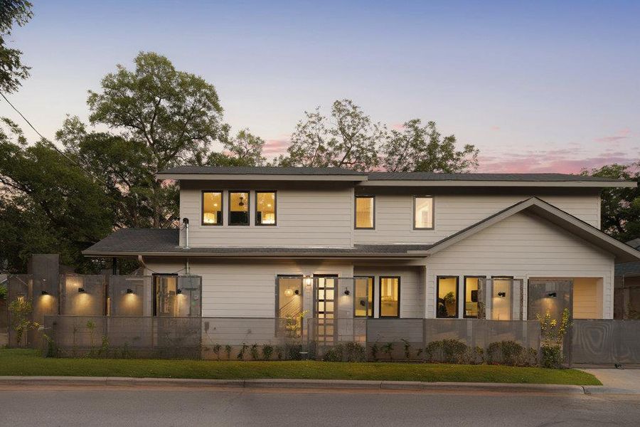 View of front of home featuring a fenced front yard View of front of home featuring a fenced front yard