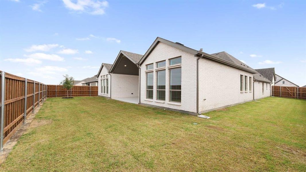 Exterior details and patio area of a home in Myrtle Creek 71', Waxahachie (Image 2). Exterior details and patio area of a home in Myrtle Creek 71', Waxahachie (Image 2).
