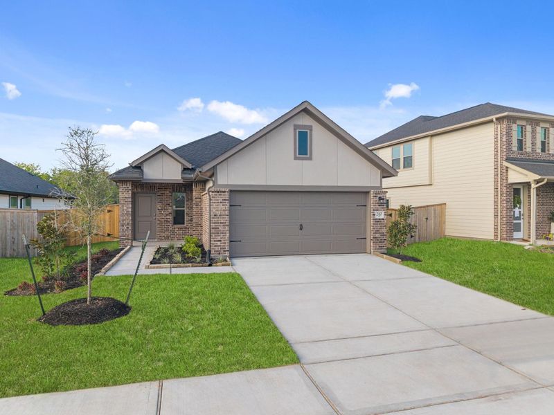 Front exterior of a new home in Laurel Landing, Alvin, TX, highlighting curb appeal (Image 20).