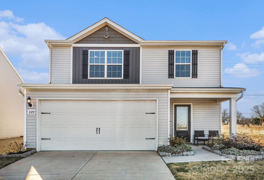Front exterior of a new home in , Shelby, NC, highlighting curb appeal (Image 24).