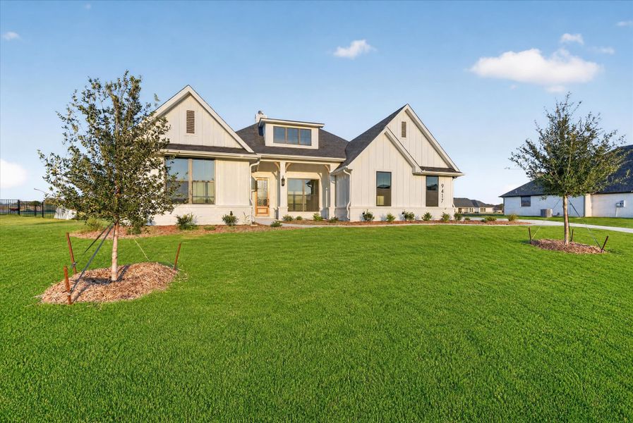 Front exterior of a new home in Paloma Ranches, Justin, TX, highlighting curb appeal (Image 26).