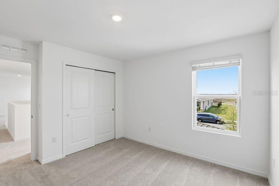 Spacious, unfurnished interior of a new home in Waterstone, Groveland (Image 24).