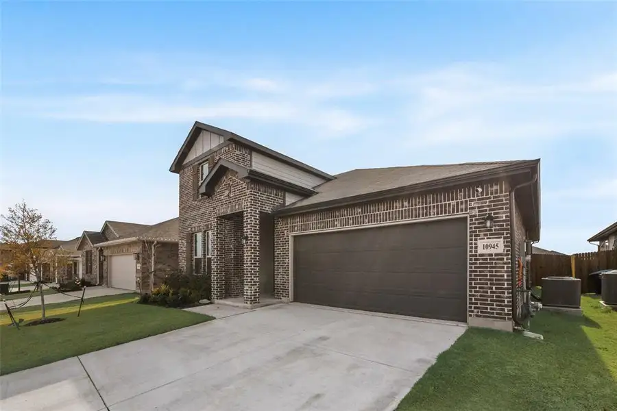 Front exterior of a new home in , Fort Worth, TX, highlighting curb appeal (Image 1). Front exterior of a new home in , Fort Worth, TX, highlighting curb appeal (Image 1).