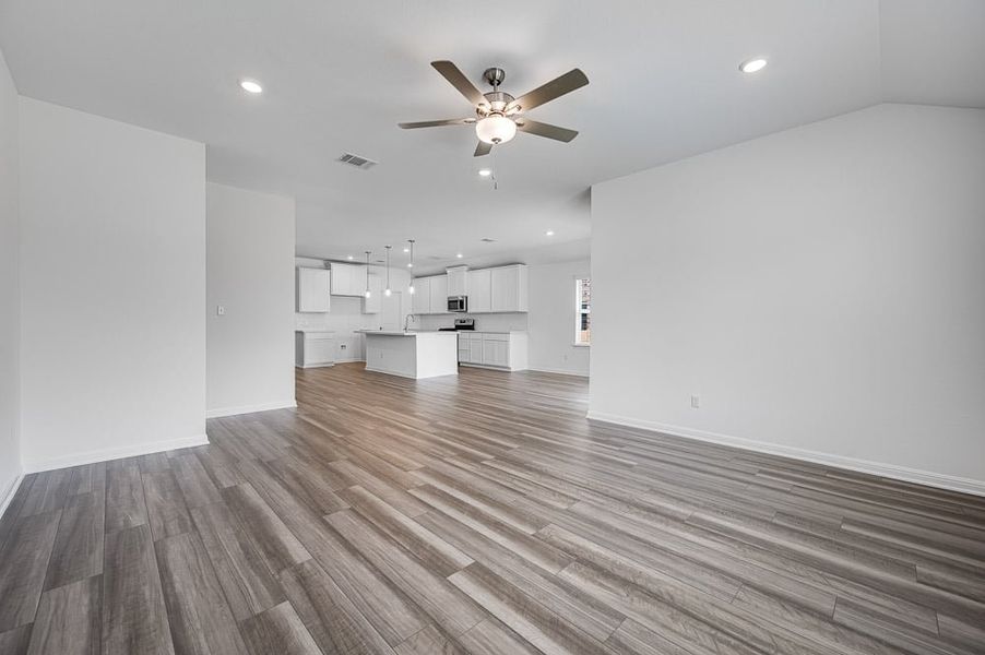Representative unfurnished interior of a home built from the Mockingbird by Taylor Morrison in Longview 50s, Del Valle (Image 7).
