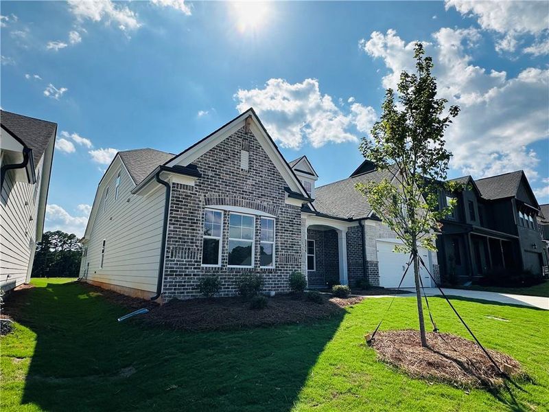 Front exterior of a new home in Summerlin, Winder, GA, highlighting curb appeal (Image 26).