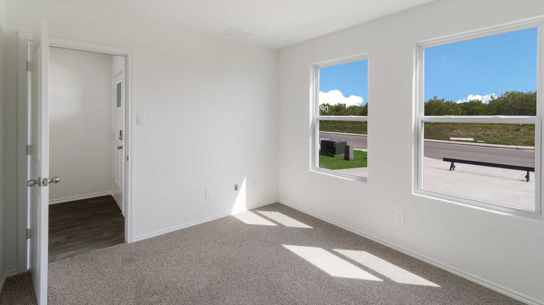 Representative unfurnished interior of a home built from the The Dahlia by D.R. Horton in Marigold, Kyle (Image 9).