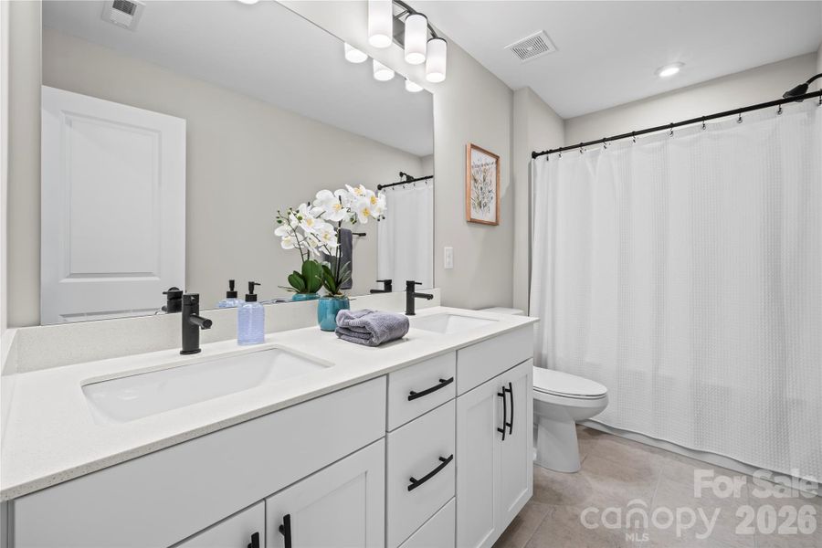 Furnished interior view inside a new home in Roseshire Chase, Huntersville (Image 5). Furnished interior view inside a new home in Roseshire Chase, Huntersville (Image 5).