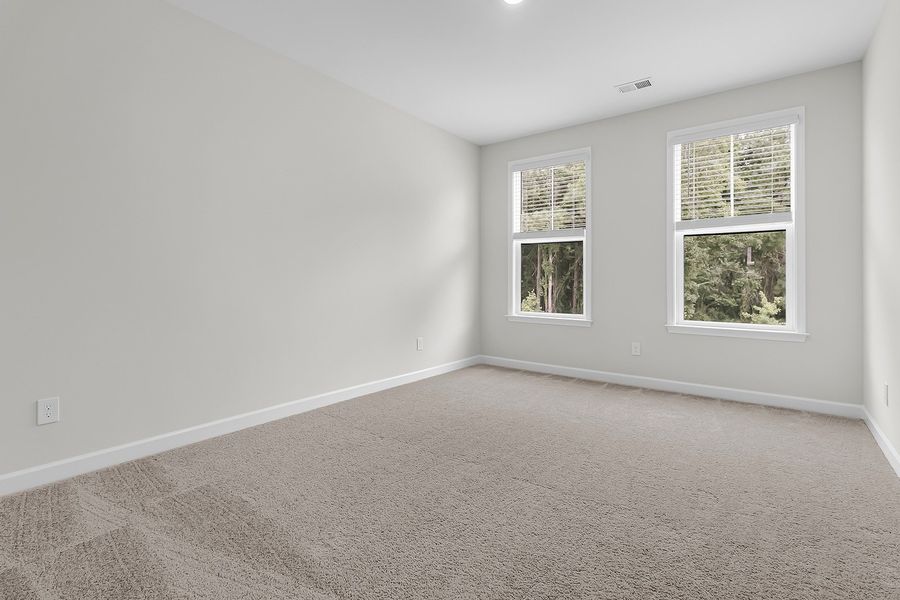 Spacious, unfurnished interior of a new home in Pineland Preserve, Summerville (Image 32).