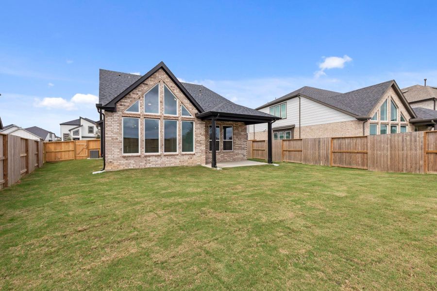 Exterior details and patio area of a home in Meridiana 40', 65', Iowa Colony (Image 3).