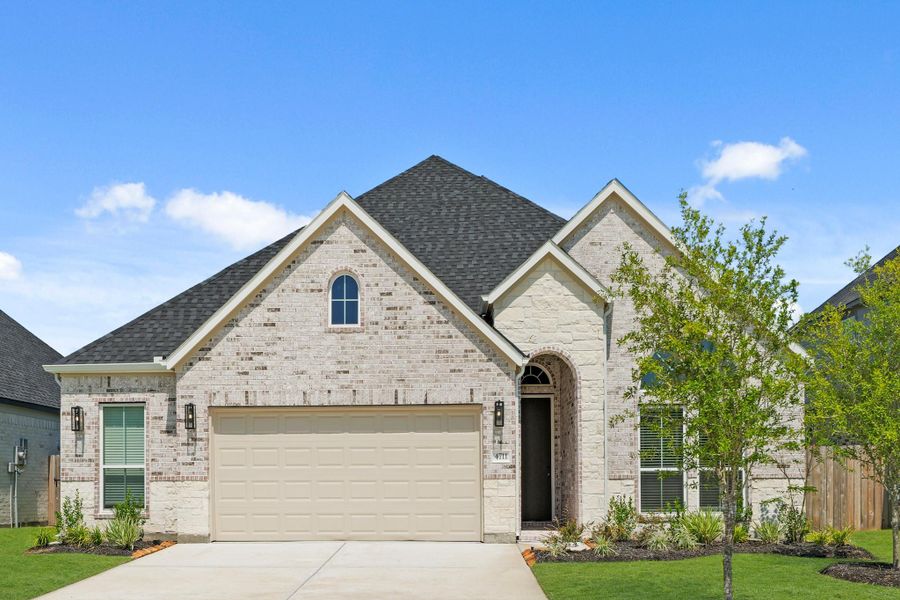 Front exterior of a new home in Briarwood Crossing, Rosenberg, TX, highlighting curb appeal (Image 24).
