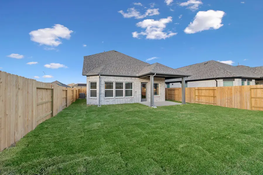 Exterior details and patio area of a home in Marvida, Cypress (Image 3). Exterior details and patio area of a home in Marvida, Cypress (Image 3).