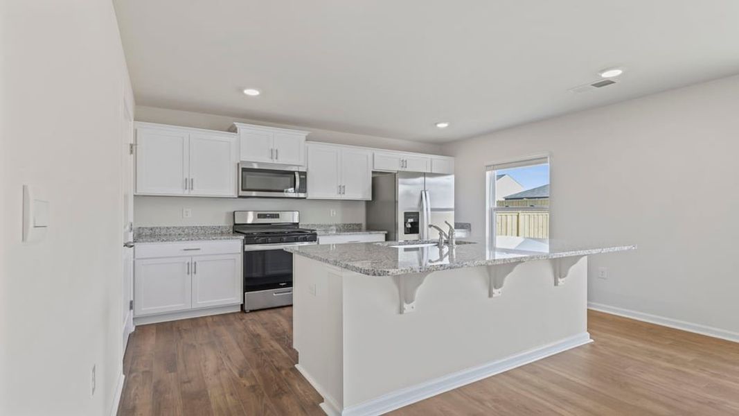 Furnished interior view inside a new home in Lightwood Cottages, Moore (Image 7).