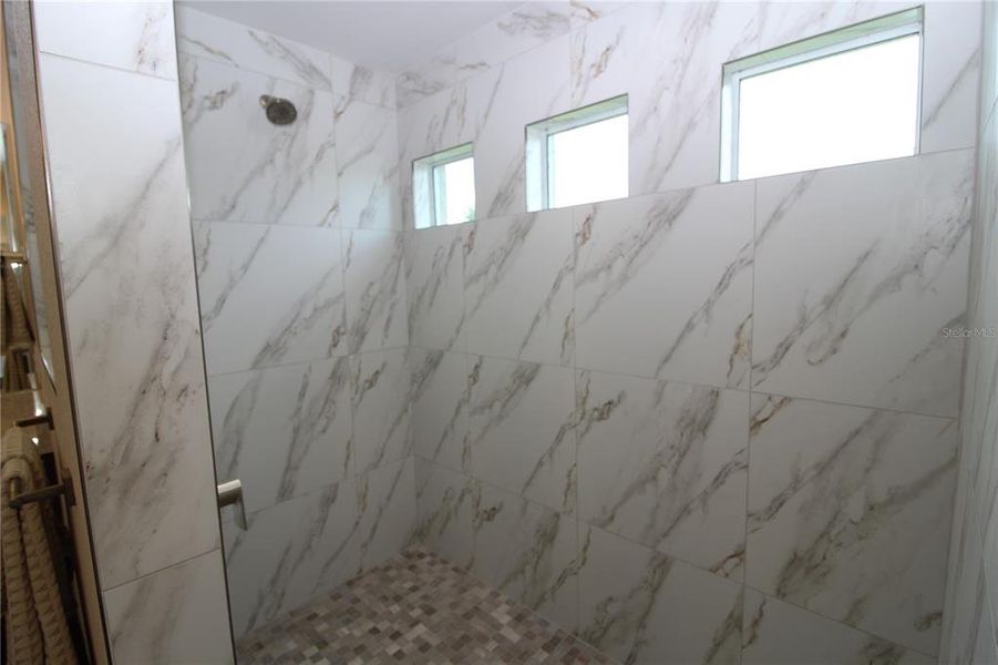 Spacious, unfurnished interior of a new home in , Port Charlotte (Image 40).