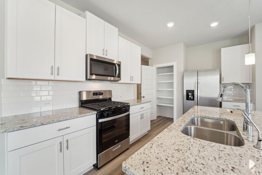 Photo is not of the actual home, but is an inspirational photo of builder’s model home and may depict options, furnishings, and/or decorator features that are not included Photo is not of the actual home, but is an inspirational photo of builder’s model home and may depict options, furnishings, and/or decorator features that are not included