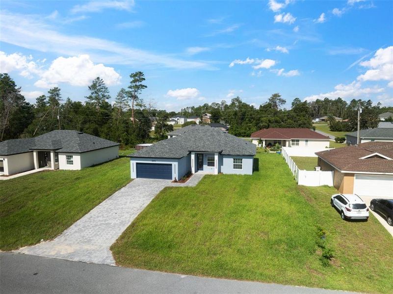 Front exterior of a new home in , Ocala, FL, highlighting curb appeal (Image 23).