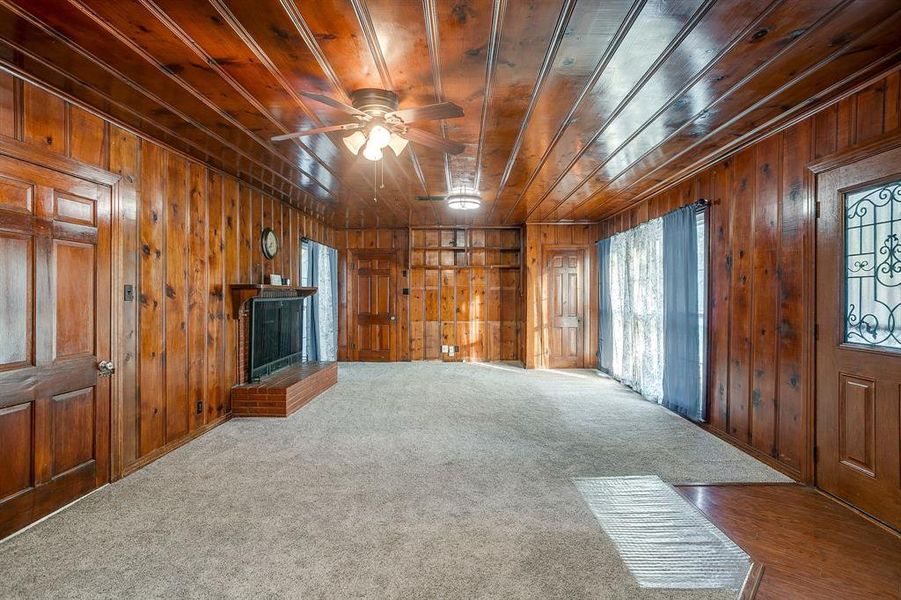 Spacious living room with rustic charm. Spacious living room with rustic charm.