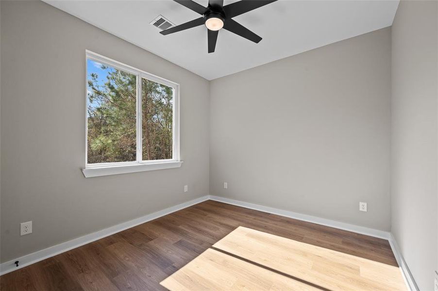 1st bedroom located at the front of the home. This room faces the front year/street.