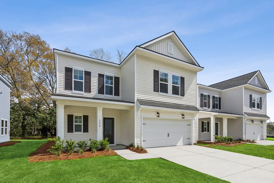 Front exterior of a new home in Discover - Select, Charleston, SC, highlighting curb appeal (Image 19).