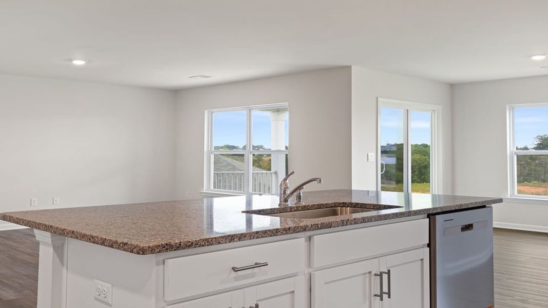 Furnished interior view inside a new home in Lakestone, Woodruff (Image 5).