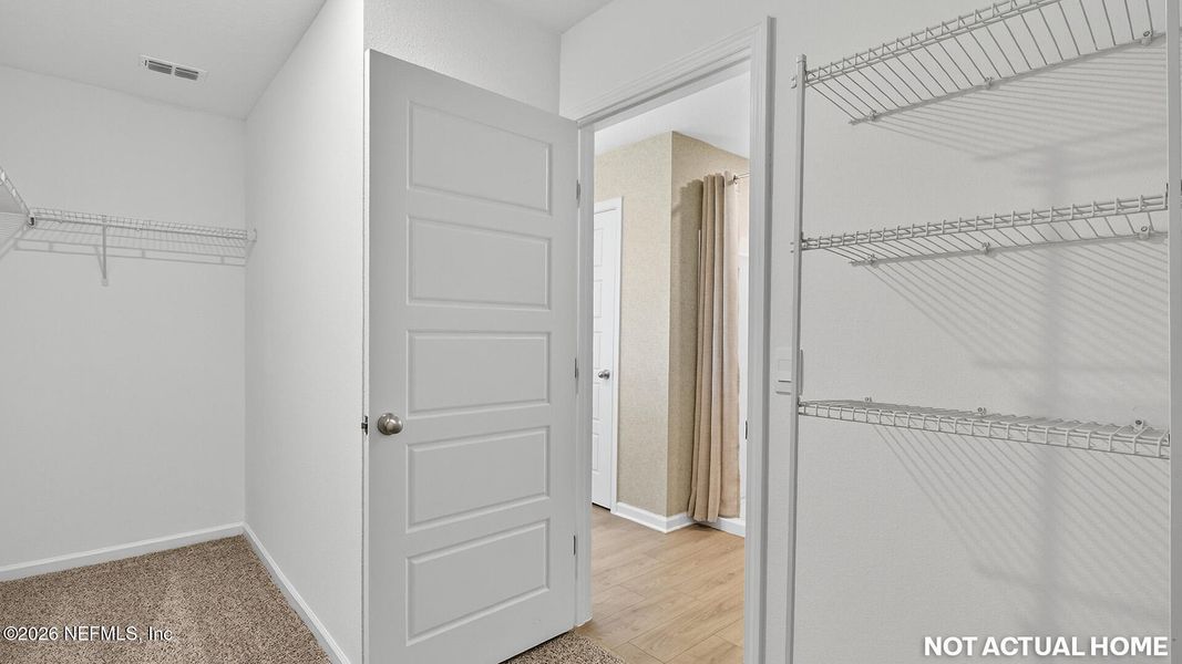 Spacious, unfurnished interior of a new home in Sawmill Branch, Palm Coast (Image 22).
