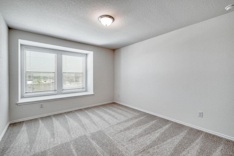 Spacious, unfurnished interior of a new home in Mustang Valley, Manor (Image 11). Spacious, unfurnished interior of a new home in Mustang Valley, Manor (Image 11).