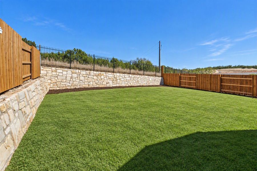 Exterior details and patio area of a home in West Cypress Hills, Spicewood (Image 4). Exterior details and patio area of a home in West Cypress Hills, Spicewood (Image 4).