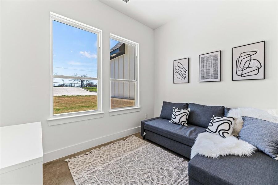 Living area with baseboards Living area with baseboards